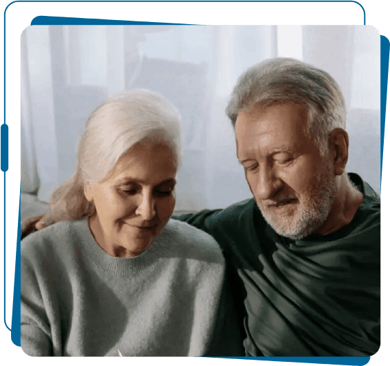 A man and woman sitting next to each other.